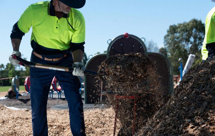 worker using a shovel