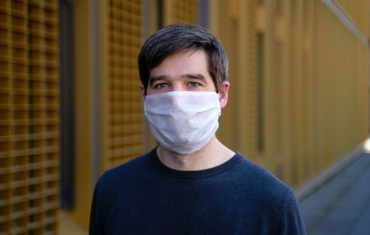 Young man in face mask