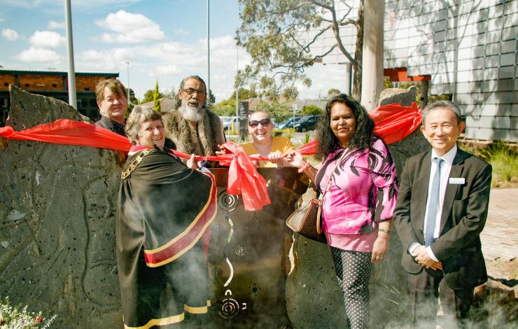 Ribbon cutting at unveiling 