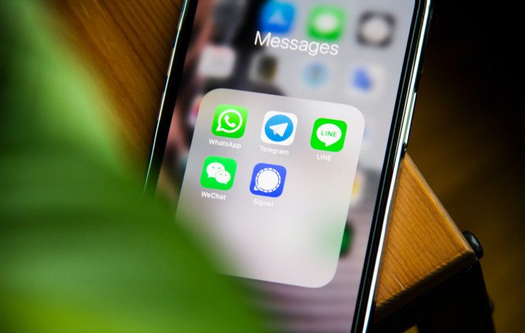 mobile phone showing messaging apps