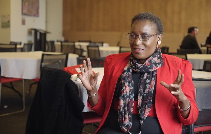 Selba woman in red jacket