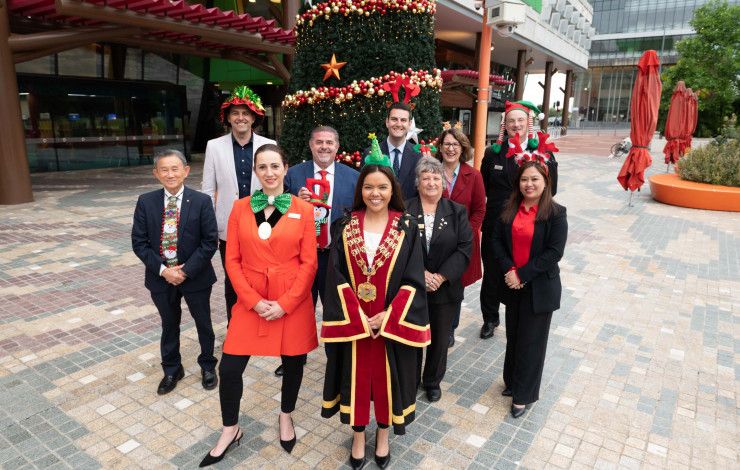 Greater Dandenong City Councillors under a Christmas Tree