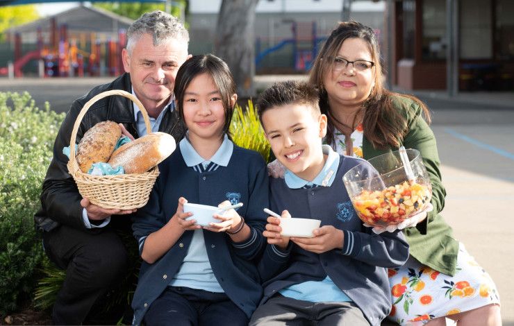 Teachers and students share a healthy breakfast