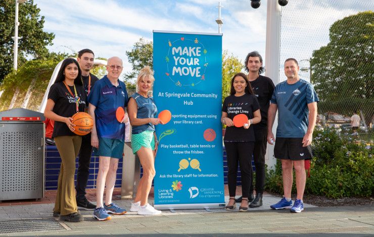 people holding sports equipment outside