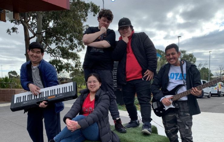 a group of young people outside
