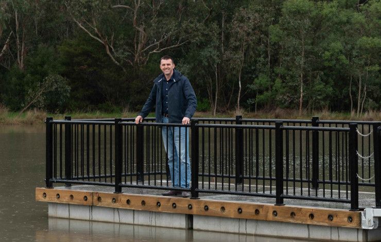 Councillor Bob Milkovic standing on the jetty at Tirhatuan Park
