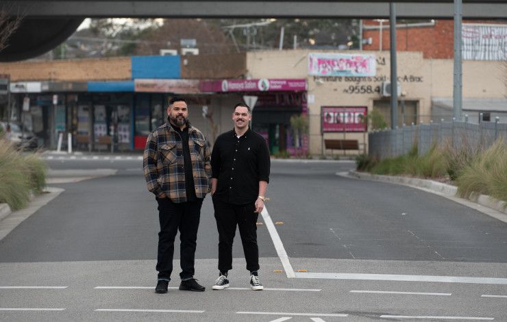 Artists Robert Michael Young and Koby Sainty standing in the middle of a road