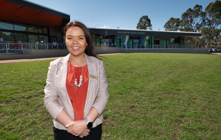 Mayor, Councillor Eden Foster in front of a new sports pavilion
