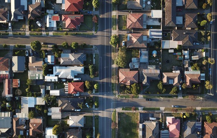 image looking down on house roofs
