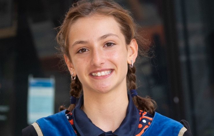 junior may in robes with medal