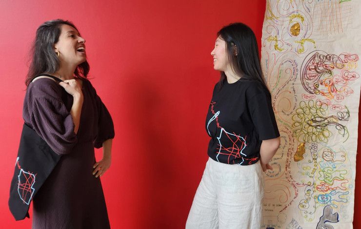 Modeling the clothes at the Walker Street shop