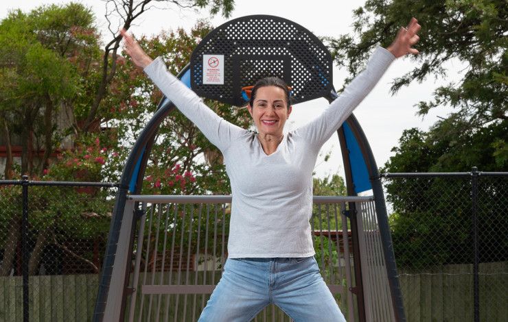 Cr Lana Formoso at a park with a basketball ring in the background