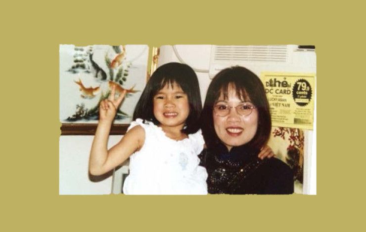 A mother and child smiling