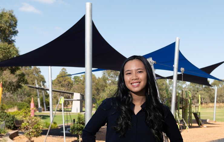 Cr Isabella Do standing in a park