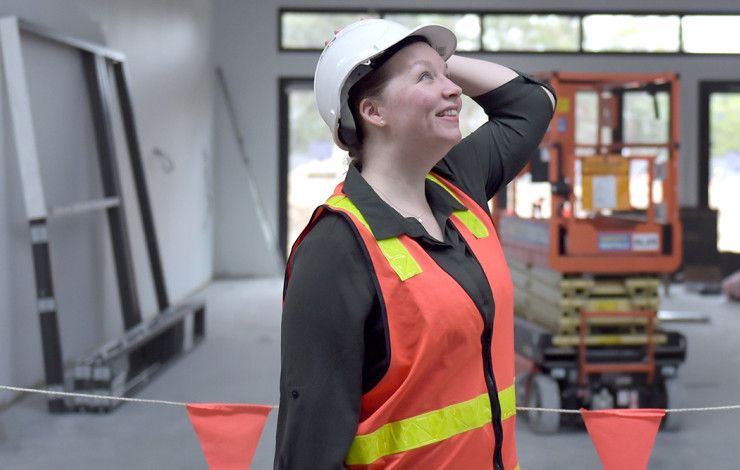 Coordinator Building Projects, Samantha Ackland lady looking at a project