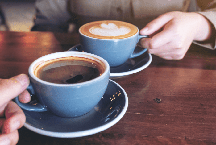 two coffees on a table