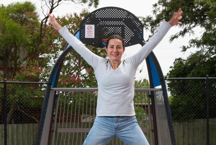 Cr Lana Formoso at a park with a basketball ring in the background