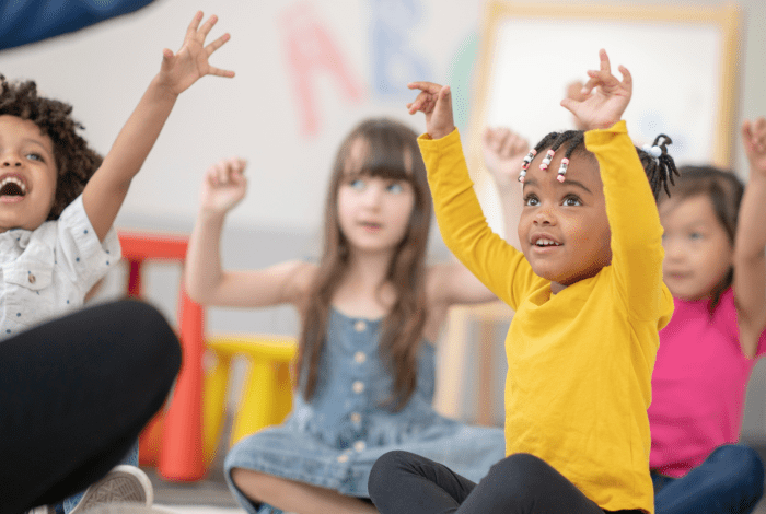 Children enjoying a story in the library