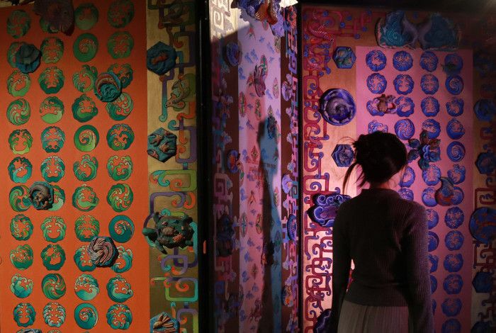 A person looking at an exhibtion