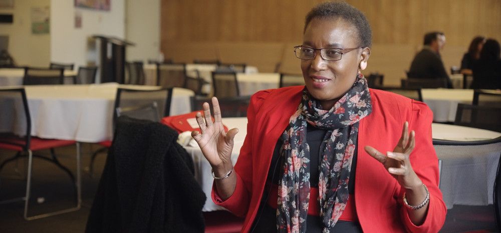 Selba woman in red jacket