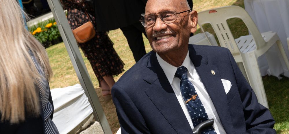 A smiling Joe de Souza