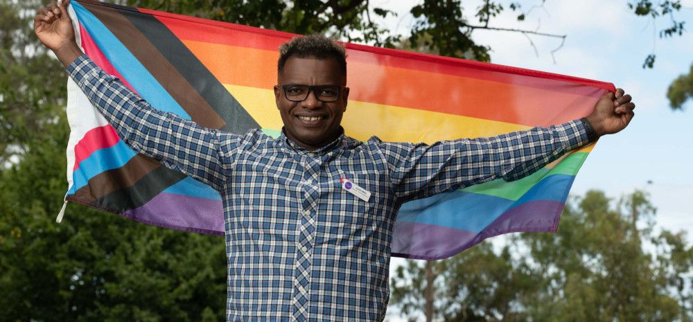 Proud ally Junior Melo flies the rainbow flag