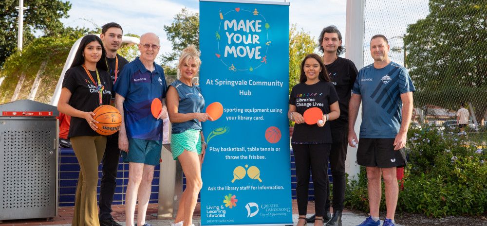 people holding sports equipment outside