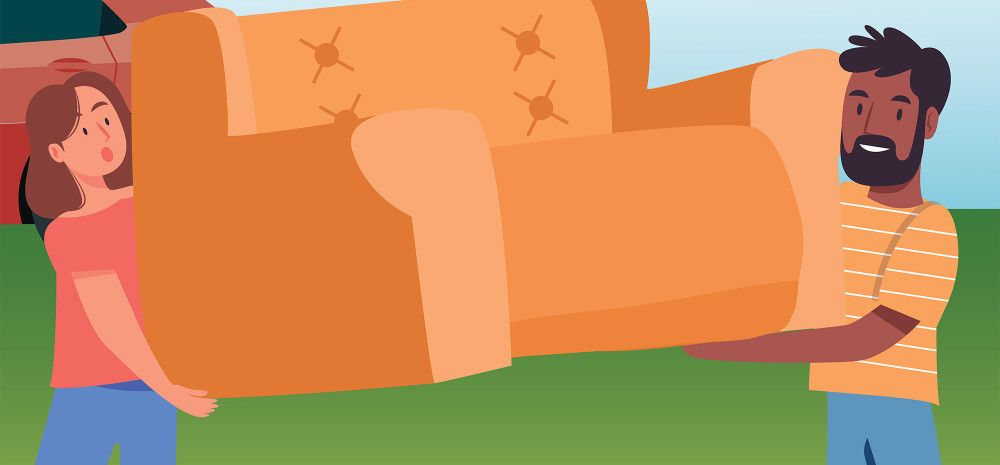 Man and lady carrying couch to car