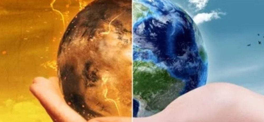 A hand holding an earth