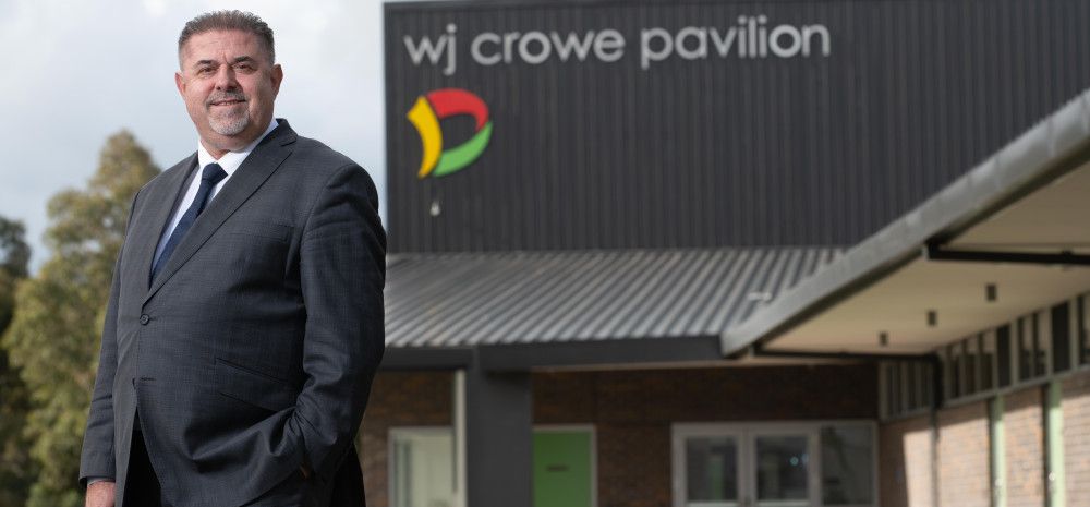 Councillor Jim Memeti in front of the WJ Crowe Pavilion
