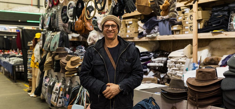 Taskin from Dandy Australian Gifts and souvenirs infront of his shop