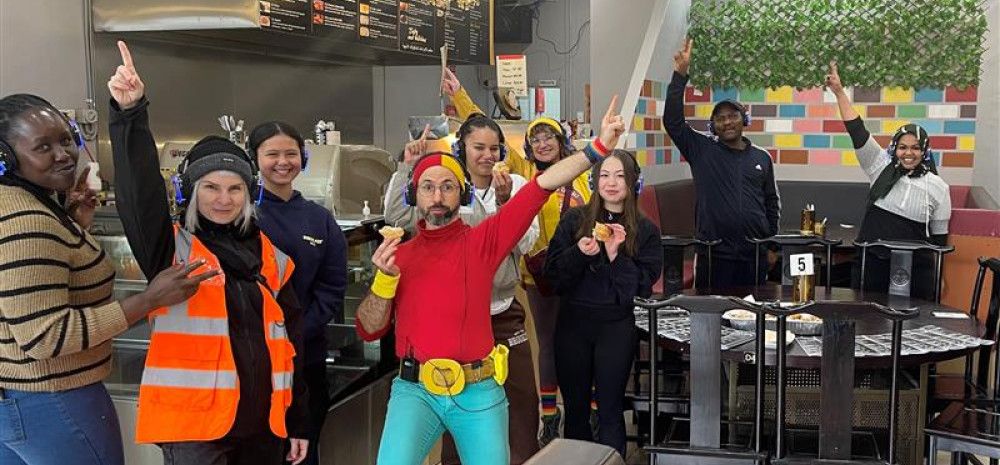 Silent Disco people with hands in the air