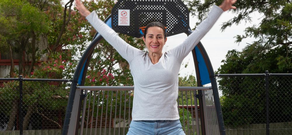 Cr Lana Formoso at a park with a basketball ring in the background