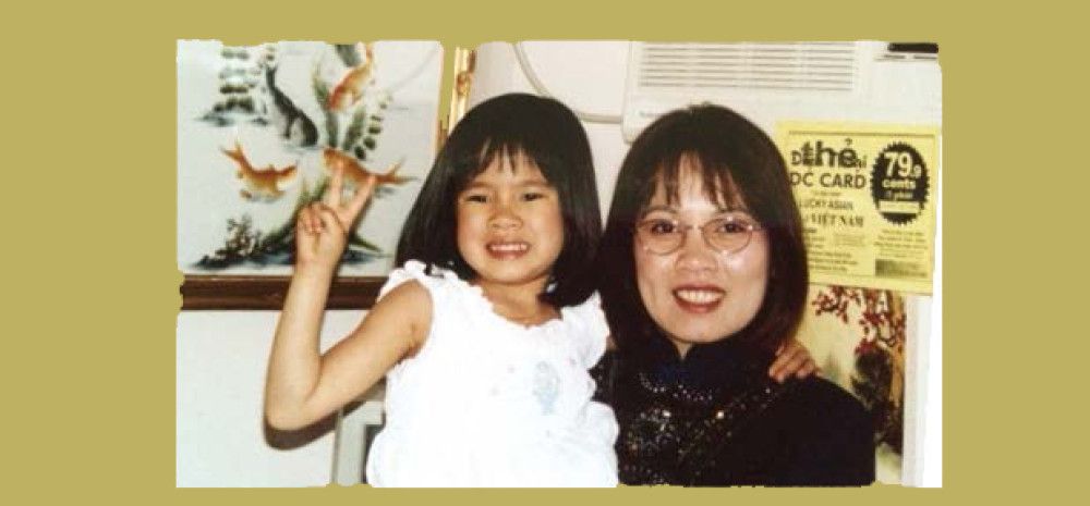 A mother and child smiling