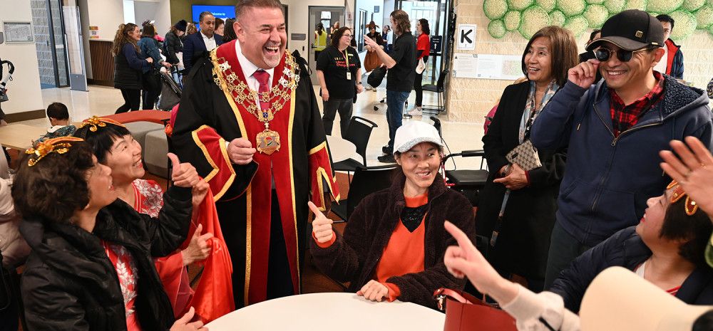 Mayor Cr Jim Memeti at the Community Hub opening with other people