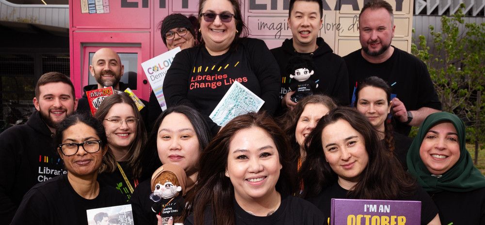 Cr Sophie Tan and Library staff in front of the Little Library