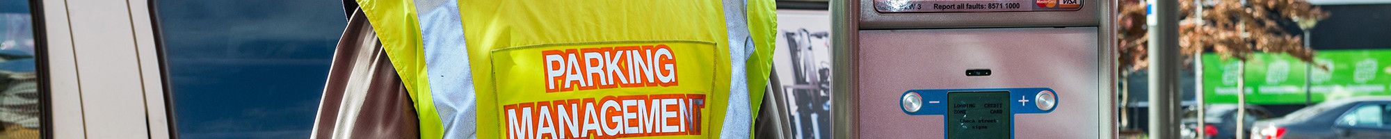 Parking officer with ticket machine