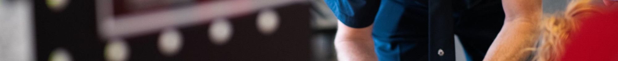 Police officer writing a message for white ribbon day