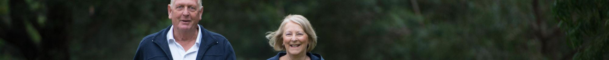 Senior couple walking in a park
