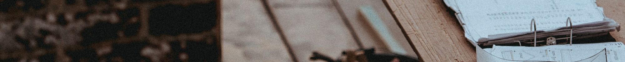 Building site with plans on a table