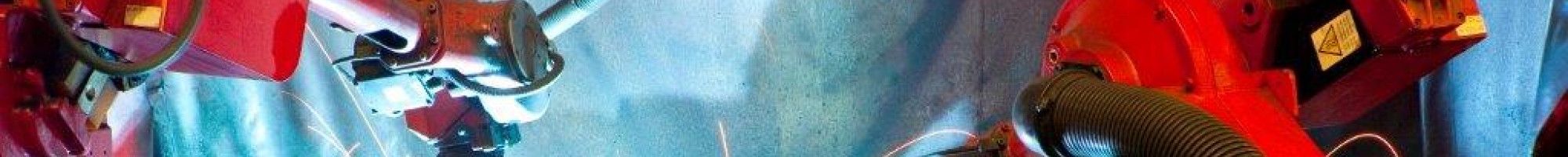 robots welding a component