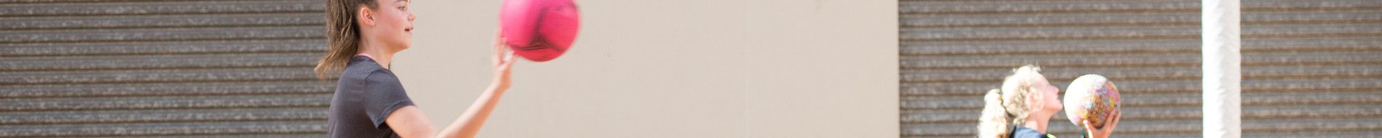 Girls playing netball