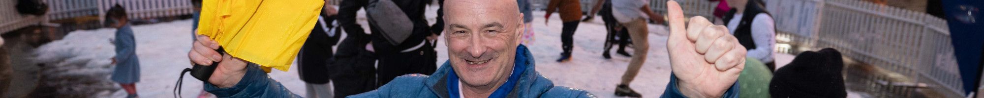 Councillor Sean O'Reilly in front of a snow play area at Springvale Snow Fest