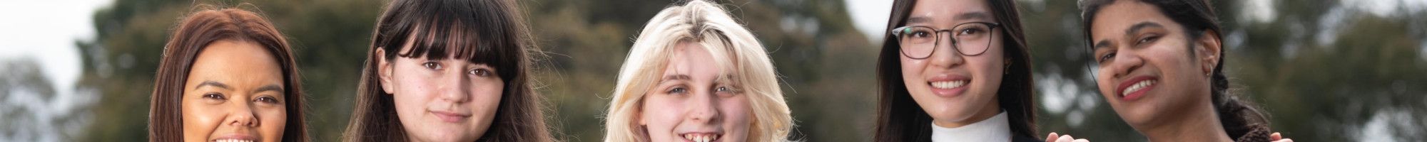 Four young women meet with Mayor Eden Foster