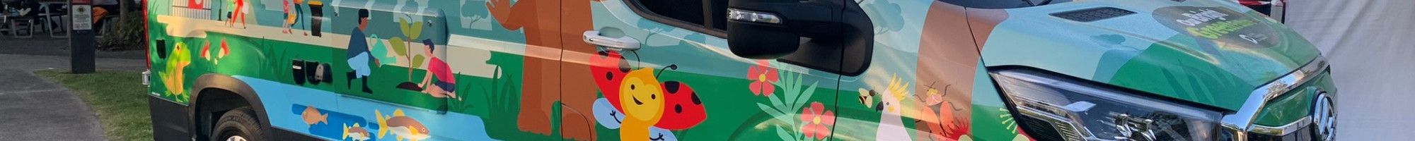 electric Van with Our Bright Green Future graphics on the side