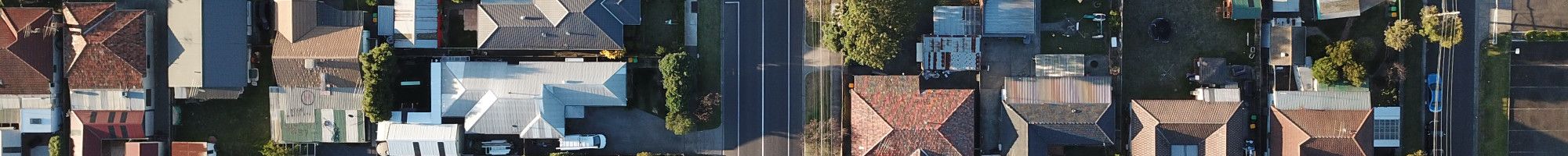 image looking down on house roofs
