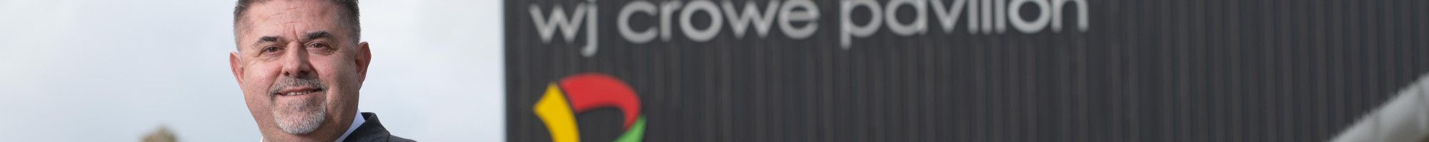 Councillor Jim Memeti in front of the WJ Crowe Pavilion