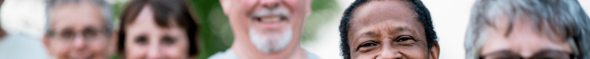 Older people using hand weights.