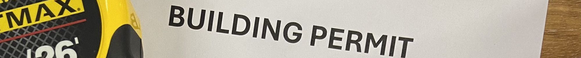 Papers, pen and measuring tape