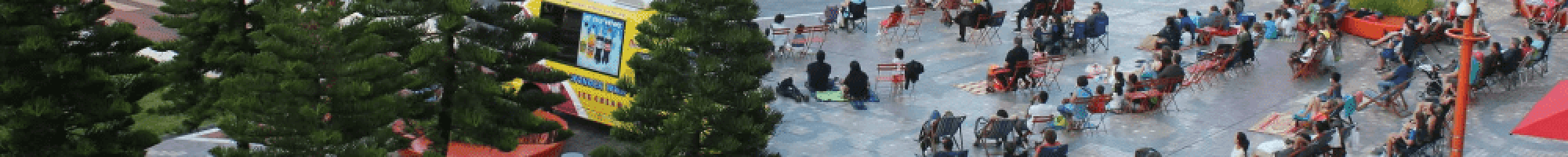 People watching the Urban Screen in Harmony Square